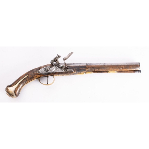 177 - An 18th century flintlock pistol,  the 11 1/4 inch two stage barrel with anthemion decoration over c... 