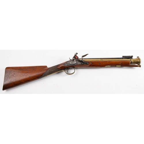 181 - An early 19th century brass barreled flintlock blunderbuss by Bond of London,  the 14 1/4 inch three... 