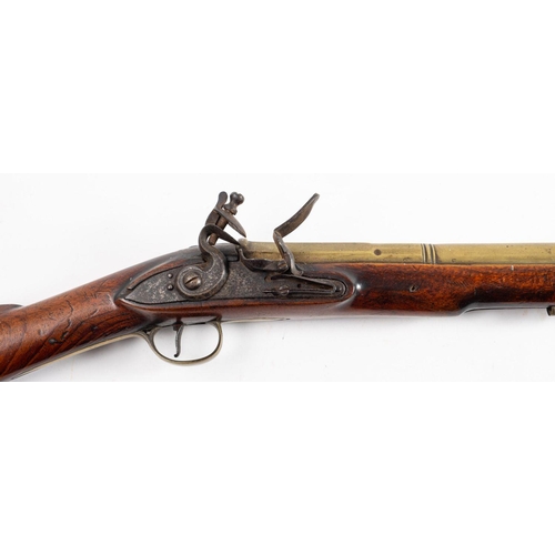 182 - A 19th century brass barreled flintlock blunderbuss, unsigned, the 13 1/12 inch two stage barrel sta... 