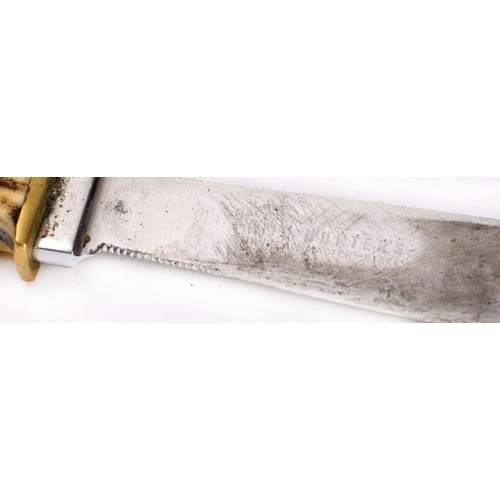 212 - An early 20th century antler handled knife, the straight single edge clipped back blade with curved ... 