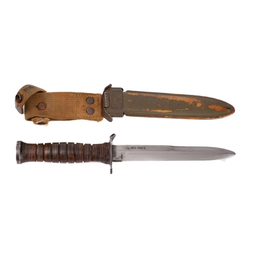 213 - A US M3 pattern trench/fighting knife, the straight double edged blade stamped 'US M3 1943' over hil... 