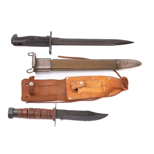 215 - A US Garrand bayonet,  the straight single edge fullered blade stamped 'ENS E-US' with grenade motif... 