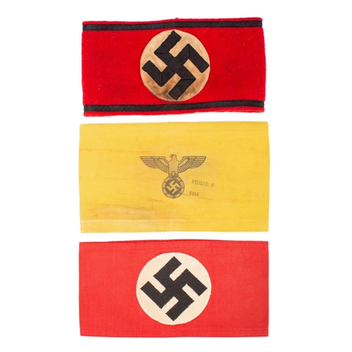 292 - A German State or Civilian Service arm band yellow with printed eagle and swastika, date stamped '19... 