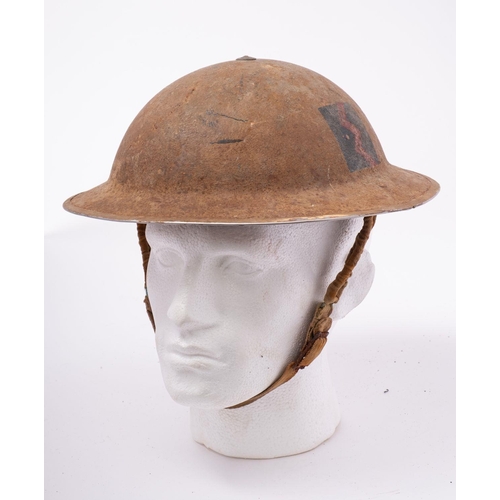 338 - A WWII South African Artillery  Mk.I steel helmet with regimental helmet flash to one side, original... 