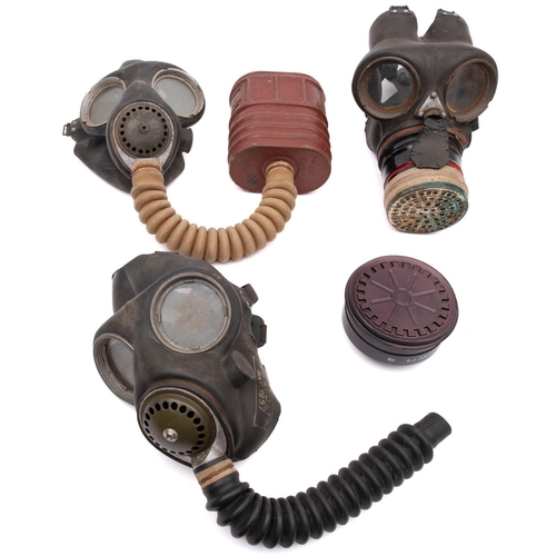 339 - A collection of various militaria, including a RAF  No.1 dress jacket,  three gas masks, a quantity ... 