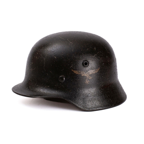 396 - A WWII period Luftwaffe M42 pattern Stahlhelm,  stamped '1420' to interior, original brown leather  ... 