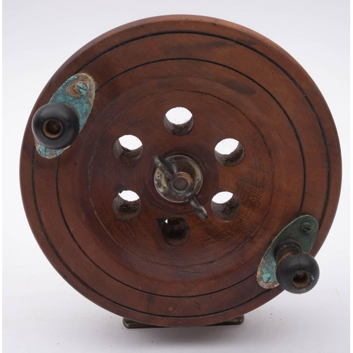 575 - A late 19th century mahogany and brass star back reel, with double horn handles, together with a 6 i... 