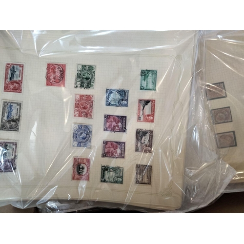 634 - Two boxes of stamps on stock sheets and album pages,  including GB, British Commonwealth.