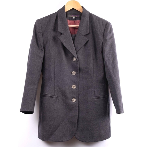 801 - Liberty. A 1980s lady's two piece grey wool suit, comprising a single breasted jacket, size 10 and m... 