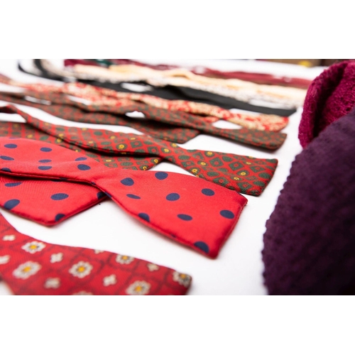 809 - A collection of silk bow ties, including a Christian Dior burgundy silk bow tie, Austin reed and oth... 