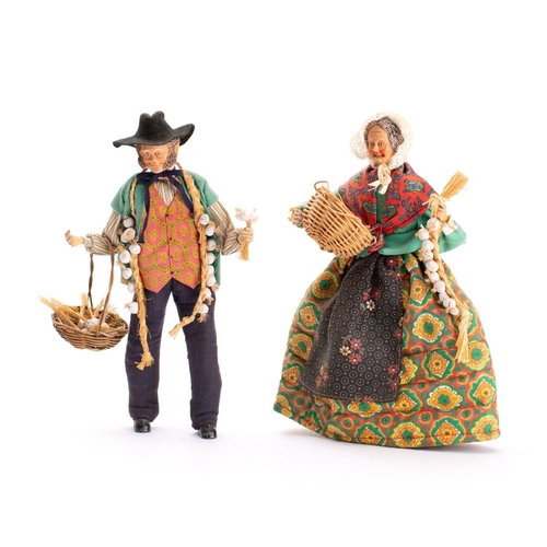 848 - A pair of early 20th century Swiss onion or garlic seller dolls, both with painted pottery heads  an... 