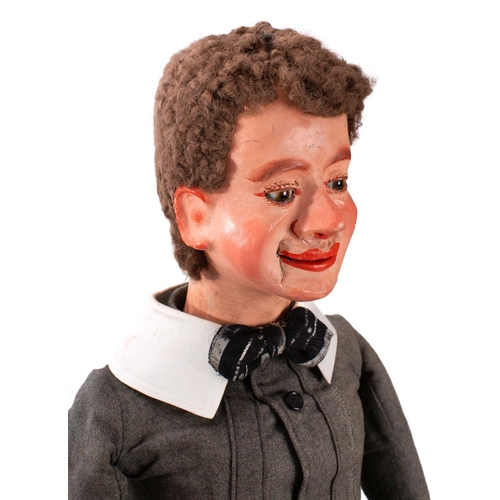 849 - A late 19th/early 20th century  ventriloquial 'dummy' figure of a young boy: the painted mache head ... 