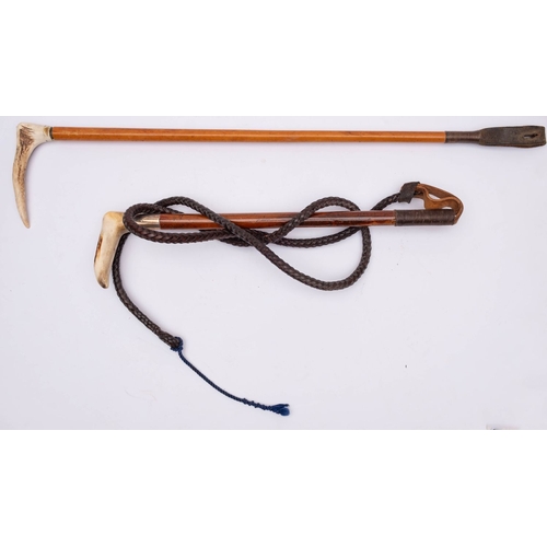61 - A white metal mounted antler handled riding whip, together with one other riding whip and a modern b... 