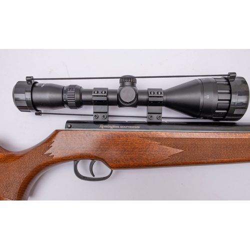 95 - A Remington Express 5.5mm break barrel air rifle, blued metalwork with automatic safety and adjustab... 