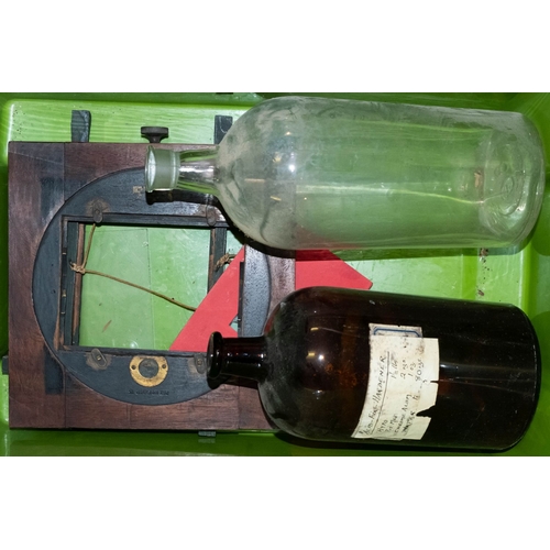 546 - A collection of early to mid 20th century photography developing bottles and other similar bottles a... 