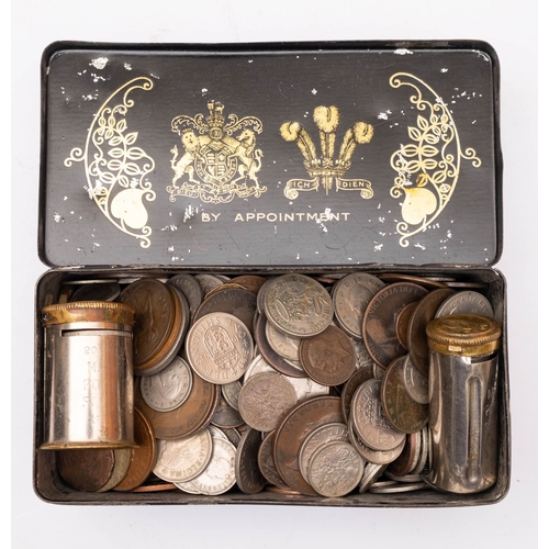 712 - A collection of mixed coins including 1858 penny and two Magic Savings bank tins.