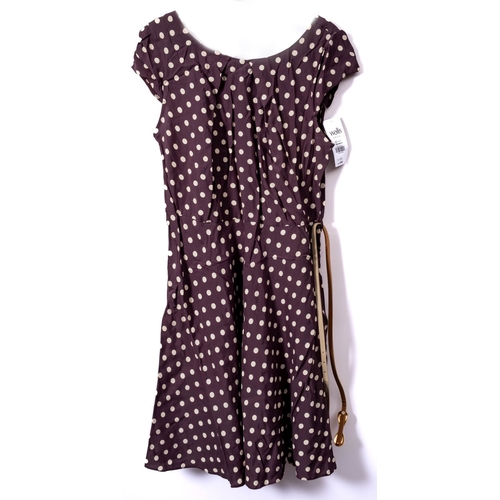 803 - A group of four 1980s lady's dresses comprising a Laura Ashley blue polka dot sleeveless dress, an I... 