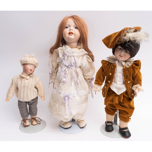 859 - A collection of nine late 20th century bisque head collectors dolls.