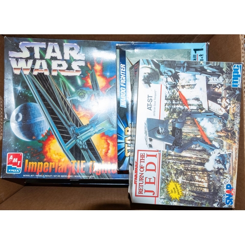 1181 - Ertl and others. A group of five Star Wars model kits,  'Darth Vader's  Tie Fighter', 'Death Star', ... 