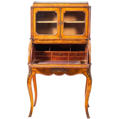 1071 - A walnut and crossbanded bureau de dame in Louis XV style, last quarter 19th century; the caddy top ... 