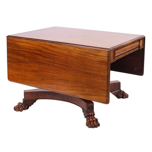 1130 - A Regency mahogany drop leaf breakfast table, circa 1815; the rectangular top with ovolo moulded edg... 