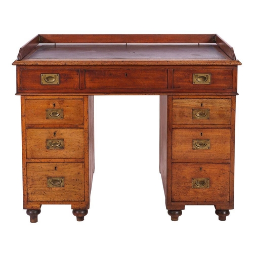 1213 - A Victorian hardwood campaign desk, late 19th century; the rectangular top with later inset faux lea... 