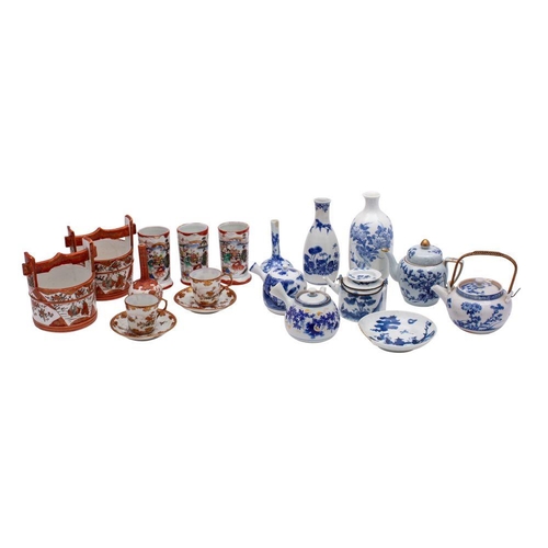 130 - A group of Japanese porcelain, primarily blue and white, but including some late Kutani wares.