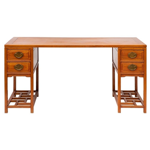 1354 - A Chinese stained hardwood desk, later 20th century; the cleated rectangular top on pedestals each w... 