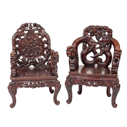 1357 - Two similar Chinese carved and stained hardwood elbow chairs, circa 1900; both abundantly carved ove... 