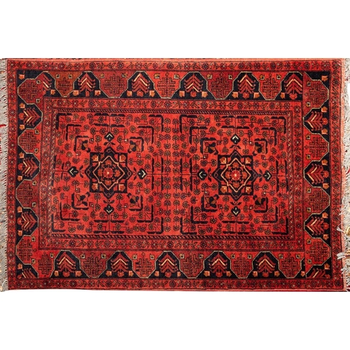 1361 - An Iranian Afghan Rug; the Belouchistal Influence red brick twin panel field with pointed geometric ... 