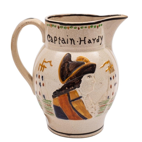 157 - A late Staffordshire ' Admiral Nelson/Captain Hardy'  pottery jug of conventional moulded form decor... 