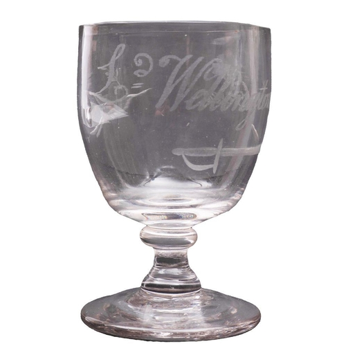 16 - A small toasting glass, the oviform bowl engraved with a sword and the caption 'Ld. Wellington for E... 