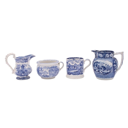 180 - A small group of blue and white transfer ware, comprising two jugs one decorated with fox hunting sc... 