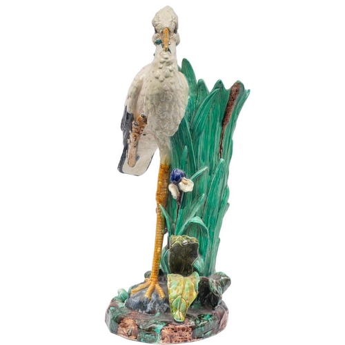 184 - A Joseph Holdcroft majolica stick stand in the form of a stork with bullrushes and iris growing from... 