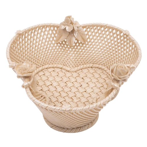 211 - A small Belleek trefoil basket with three-strand basket work, the rim applied with flower sprays, Fi... 