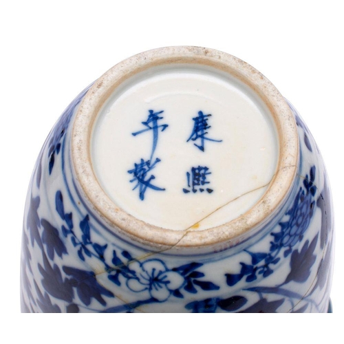 31 - A mixed group of Chinese porcelains, primarily blue and white comprising a prunus decorated baluster... 