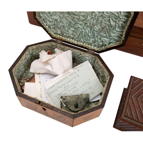 453 - A Regency penworked box, early 19th century; of octagonal section, the hinged cover decorated with a... 