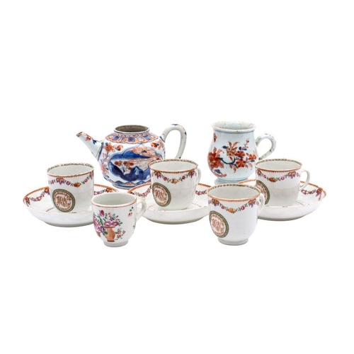 49 - A small group of Chinese porcelain, comprising four cups and three saucers enamelled with matching a... 