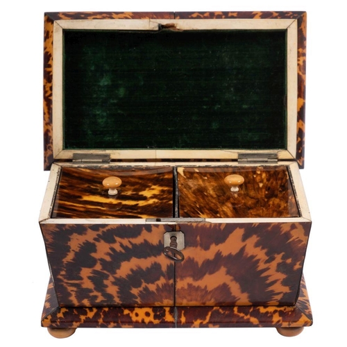 500 - WITHDRAWN  LOT   A George IV tortoiseshell tea caddy of sarcophagus form with two lidded compartment... 