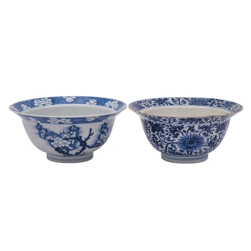 55 - Two Chinese blue and white 'klapmuts' bowls, Kangxi the first painted with prunus blossom, the rim w... 