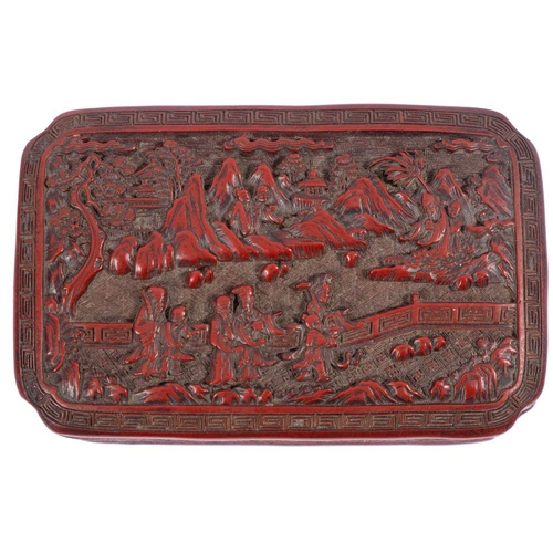 563 - A Chinese cinnabar lacquer box and cover of shaped rectangular form the cover carved with scholars a... 