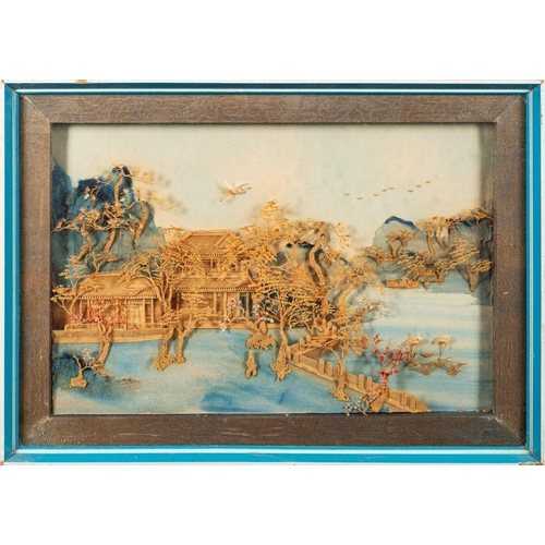 575 - A pair of Chinese carved cork dioramas depicting pavilions in lake landscapes on painted backgrounds... 