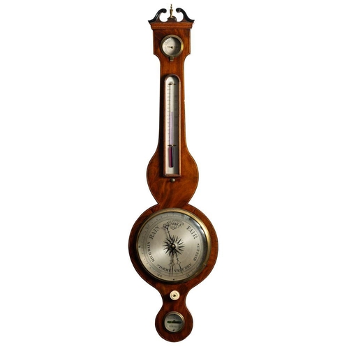 692A - A mahogany wheel barometer having an eight-inch round silvered dial with usual barometer markings, b... 