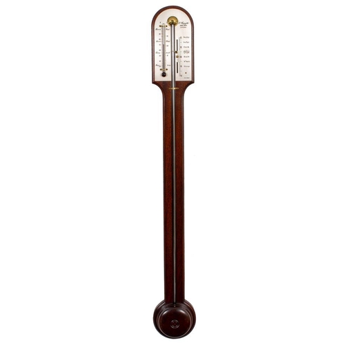 696 - Comitti, London a reproduction stick barometer the mahogany curved-top case having a turned cistern ... 