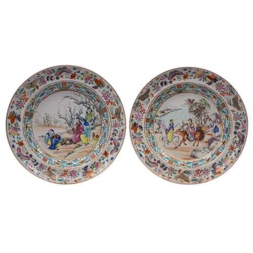 79 - A pair of Canton plates finely enamelled, one with a scholar, attendants, a crane and plum trees, th... 