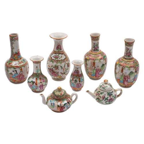 98 - A pair of small Canton bottle vases together with three similar vases and two miniature teapots and ... 