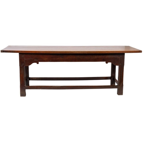 992 - A substantial oak refectory table, second quarter 18th century; the three plank top with cleated end... 