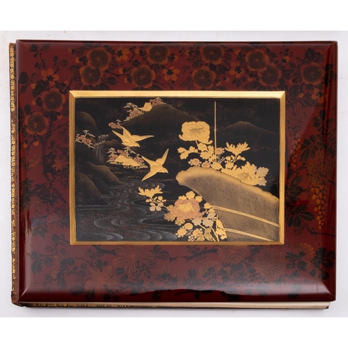 380 - JAPANESE LAQUERED ALBUM : A highly ornate album containing thirty-four  photographs several hand tin... 