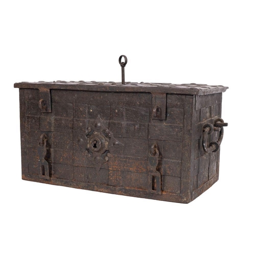 194 - A 17th century German iron strong box or 'Armada' chest: the strap work exterior with  ring hasp and... 