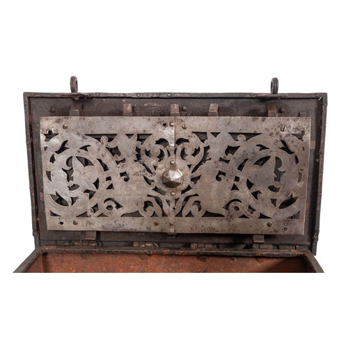 194 - A 17th century German iron strong box or 'Armada' chest: the strap work exterior with  ring hasp and... 